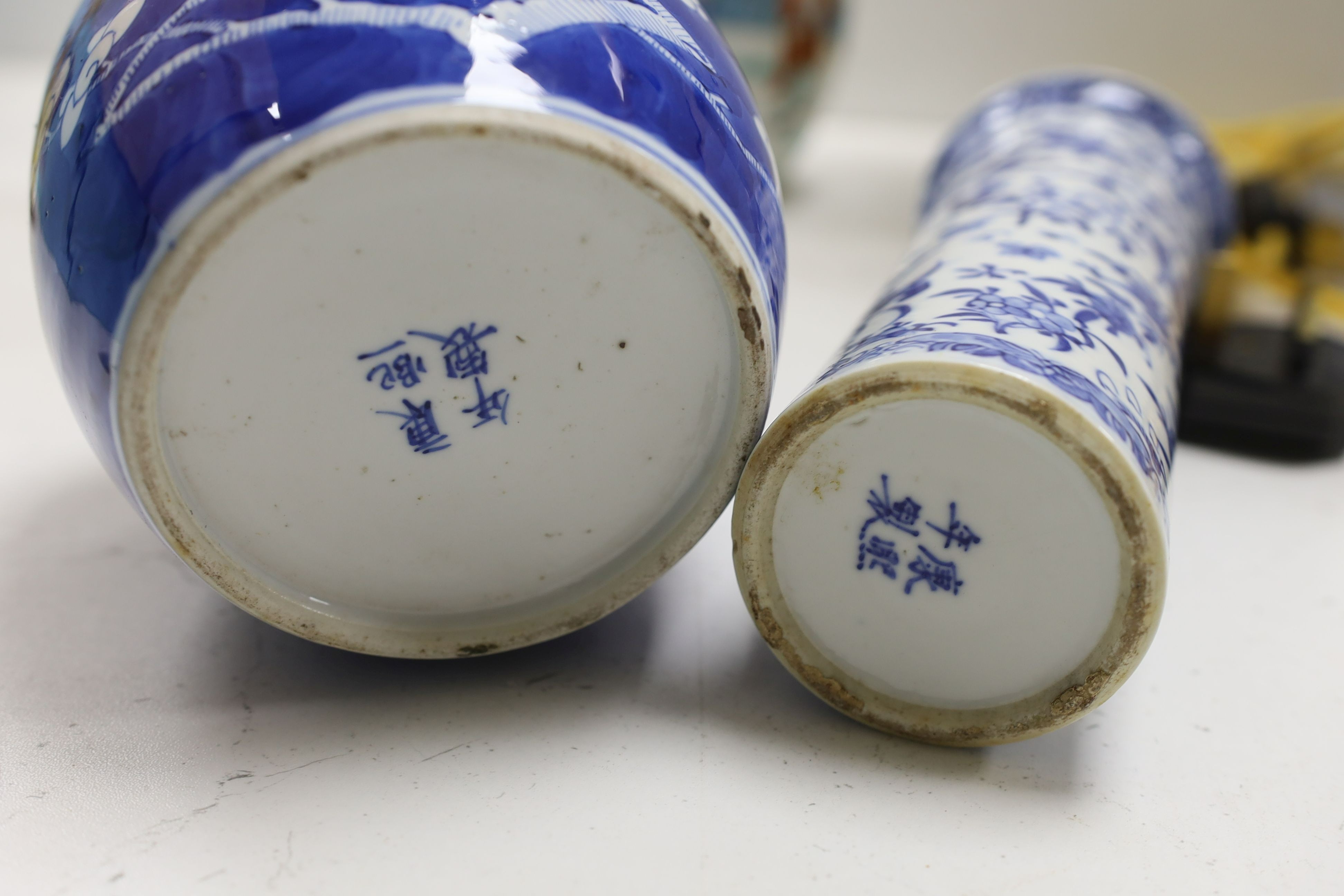 A Chinese famille rose ginger jar, a 19th century Chinese blue and white porcelain jar and cover, a blue and white cylinder vase, a small Chinese dish and orange glass vase (5)